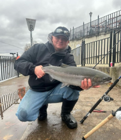 Angler posing with a big catch in New York
