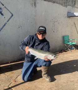 A single person fishing in Oswego