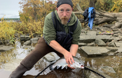Lone angler fishing at scenic NY location