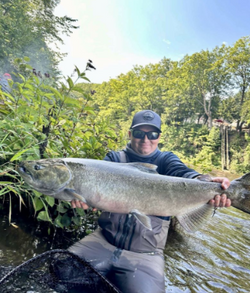 Man fishing in NY with a rod