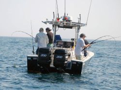 Two people enjoying a fishing cruise in Rincón