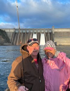 Two people enjoying a fishing trip in Branson