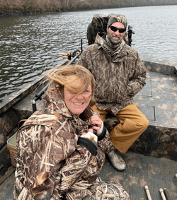 Two people fishing in MO
