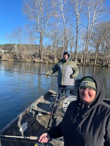 Two people enjoying a fishing trip in Missouri
