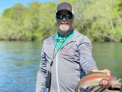 An angler caught a beautiful rainbow trout while fishing in Branson.