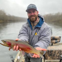 Angler holding a fish in MO