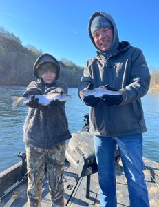 Two rainbow trout caught while fishing in MO