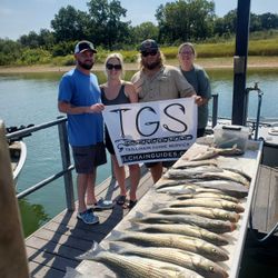 A group of 4 people fishing in OK