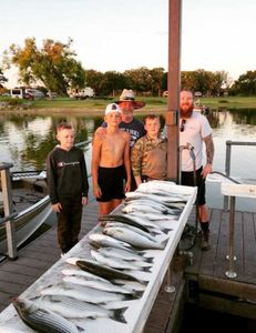 A group of 5 people fishing in Mead