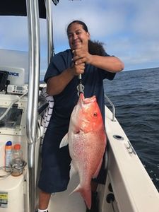 A lone angler fishing at the Port Orange Gateway Center