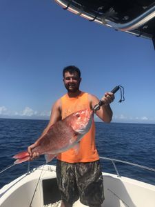 Angler with a fishing rod at the Port Orange Gateway Center