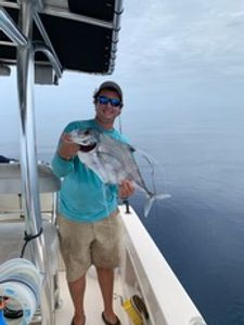 A person fishing at the Port Orange Gateway Center