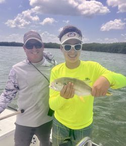 Two people fishing in FL