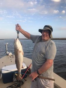 Redfish caught by lone angler in Golden Meadow