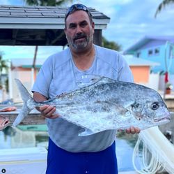Photograph of a large African Pompano fish caught during a fishing trip in Marathon, Florida.