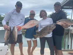 5 mutton snapper and black grouper fish caught fishing in FL