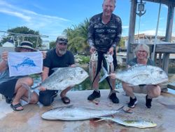 Five African Pompano fish caught by five people in Marathon, Florida