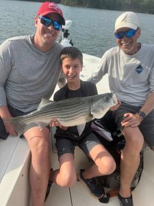 Striped bass caught by three people in Cumming
