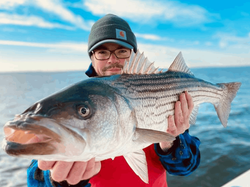 Angler holding a 26-inch fish in NJ