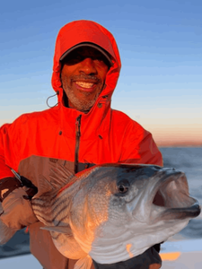 Angler with a 15-inch fish in New Jersey