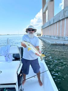 Angler enjoying a fishing cruise in New Smyrna Beach