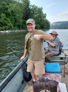 Smallmouth bass caught fishing from boat on lake in Forest Inn PA