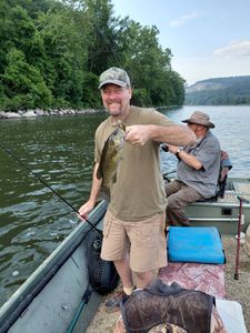 Smallmouth bass caught while fishing from boat on lake in Forest Inn PA