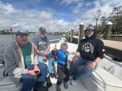 Fishing group on boat at marina dock in Gulf Shores AL