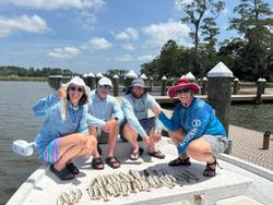 Successful fishing trip displaying fresh catch on dock at Gulf Shores AL