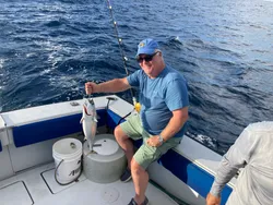 A lone fisherman enjoying an outdoor fishing experience in Florida