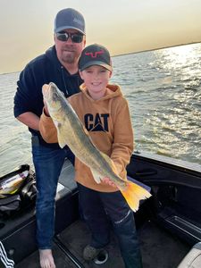 Sauger fish being caught by two people in Saskatchewan