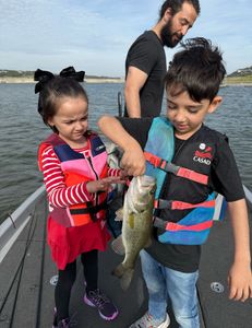 Three people fishing in TX
