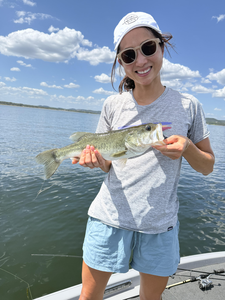 Nice largemouth bass using fly fishing and light tackle under partly cloudy skies!