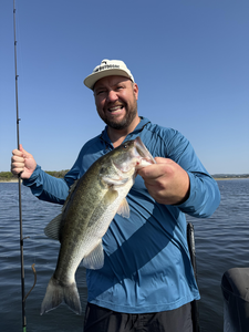 Nice largemouth bass on light tackle under clear skies!