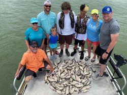 8 people fishing outdoors in TX