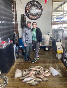 Two people on a fishing, hunting, or tour outing in Forney