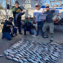 A group of 5 people enjoying fishing in Forney