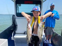 2 wiper (hybrid striped bass) fish caught in TX