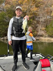 Angler holds a white crappie fish caught in MO