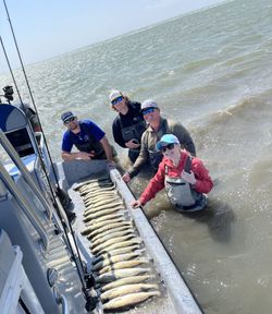 Four anglers in TX enjoying a day of fishing