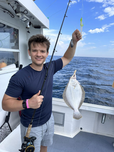 One fisherman with a big catch in Neptune City