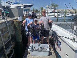 Three people fishing in Neptune City