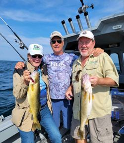 3 people fishing for 2 big fish in Dunkirk