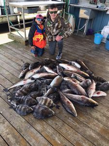 Two anglers enjoying a fishing trip in LA