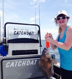 Fisherman with a black drum fish in Theriot