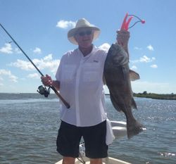 A lone angler fishing in Theriot