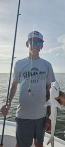 Angler with Atlantic Sharpnose Shark in FL