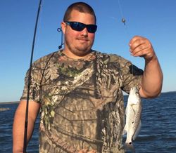 One person fishing in Apalachicola