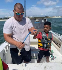 Two people enjoy a fishing trip in FL