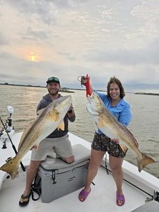 Two anglers fishing in Point Comfort